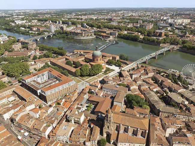 Cour du Dôme: edificio multifunzionale contemporaneo abbraccia la storia