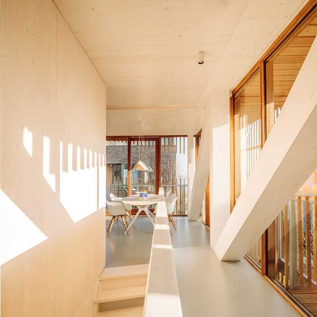 design-building-residence-complex-slats-wood-organic-innovation-construction-nature-sun-movement-privacy-interior-detail