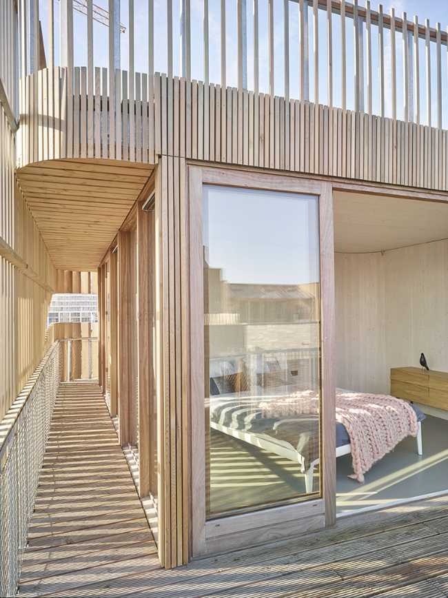 design-building-residence-complex-slats-wood-organic-construction-nature-sun-privacy-interior-detail-lighting