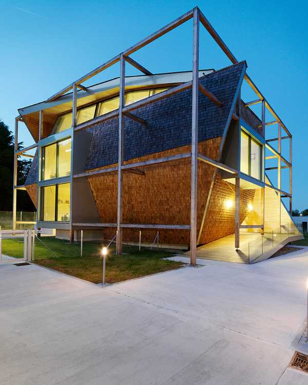 Office building exterior with internal and external lighting