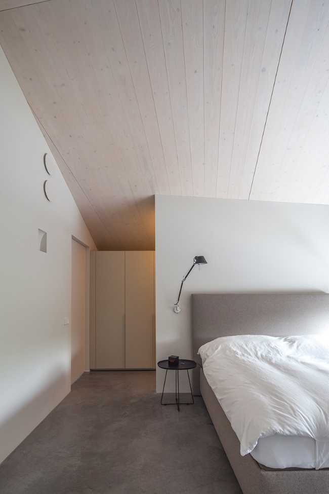 Bedroom with wooden ceiling