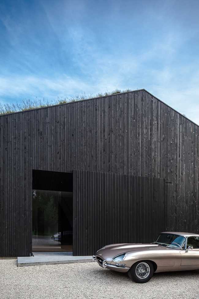 Wooden house with car