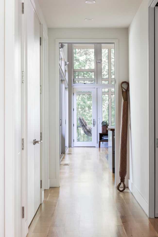 White and wood corridor with window