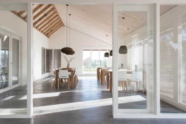 Stained glass and wood and white interior