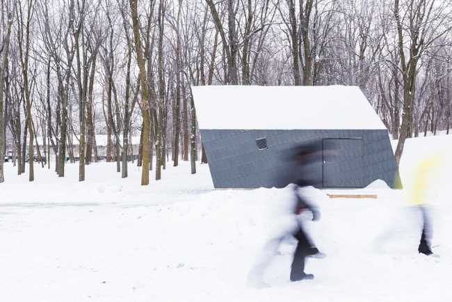 Snow-covered kiosk in nature