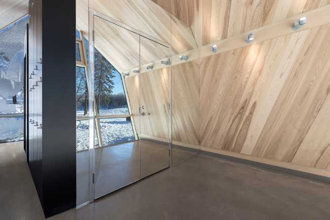 Wooden interior with full-height glazing