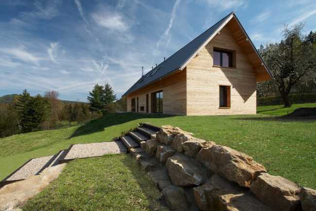 Wooden house with a gabled roof