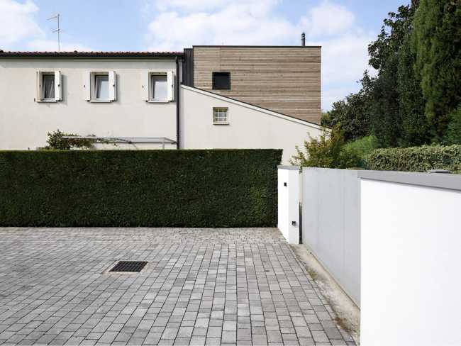 Facciata abitazione storia e ampliamento