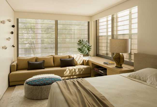 Camera da letto con divano