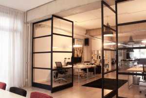 Fritsjurgens double-leaf door with retractable hinge rotating on vertical axis