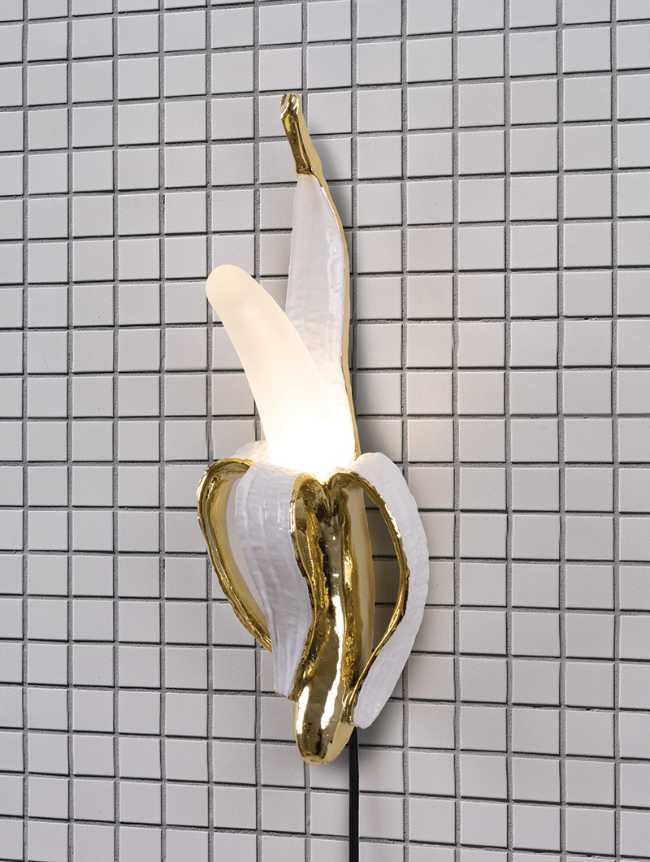 banana wall light gold and white minimal design