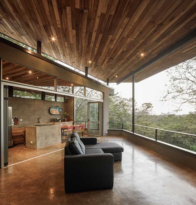 terraza de estar con techo con paneles de madera