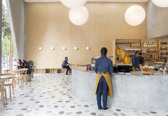 wooden wall cladding and concrete counter