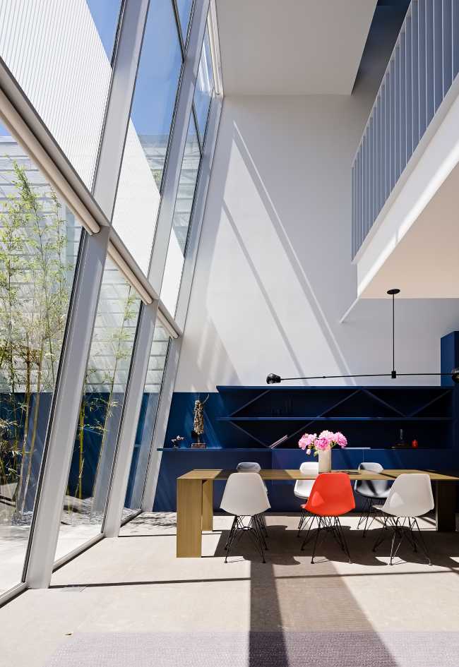 parete vetrata inclinata doppio volume