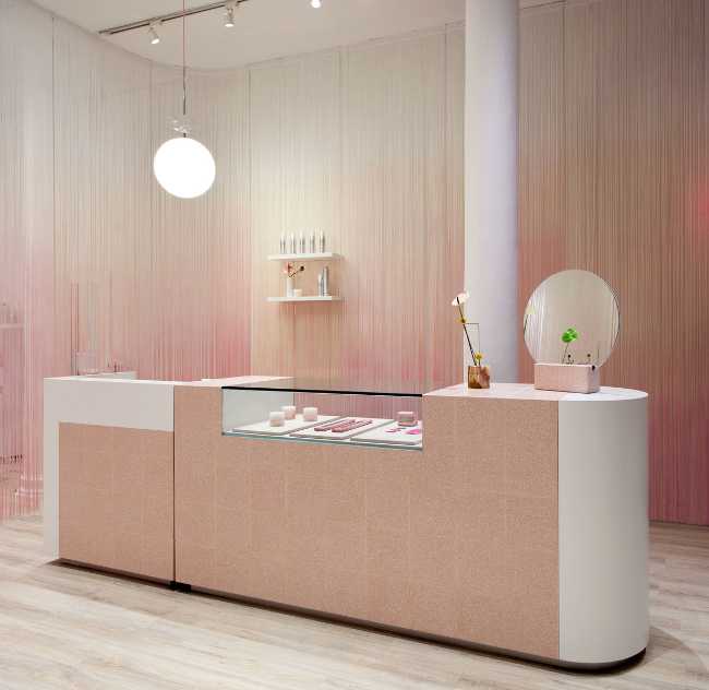 Glam Seamless: tienda elegante en rosa y blanco en Soho