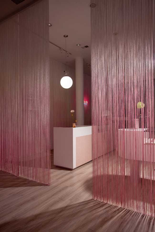 Glam Seamless: tienda elegante en rosa y blanco en Soho