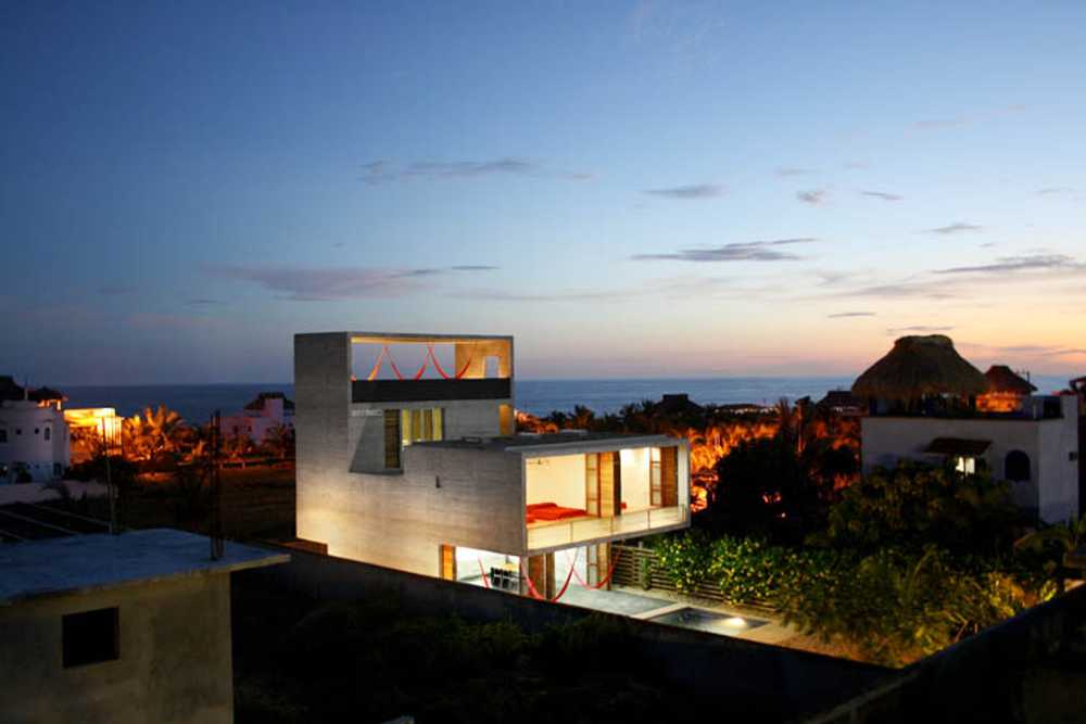 Wooden and concrete house with swimming pool