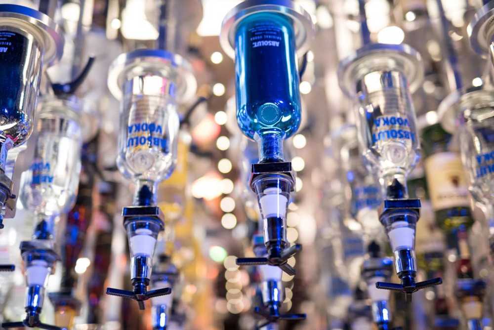 Robot barman colored bottles
