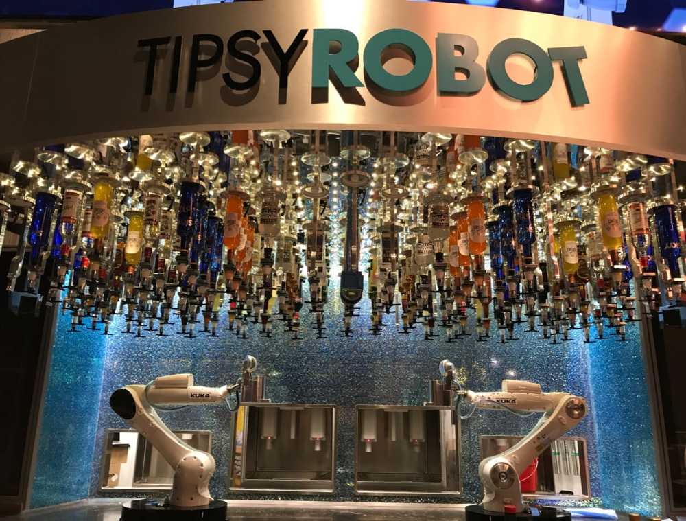 Robot barman colored bottles