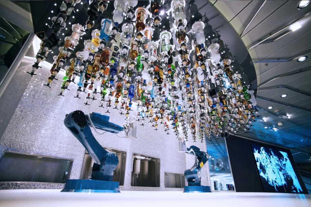Robot barman colored bottles