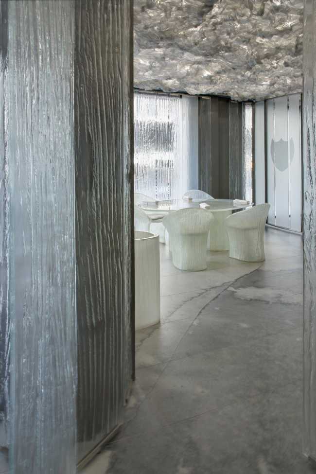 restaurant design bespoke slabs wall covering furniture