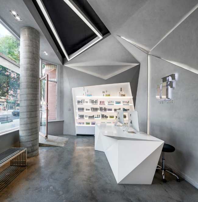 spa centro benessere negozio bancone geometrico controsoffitti tagli illuminazione