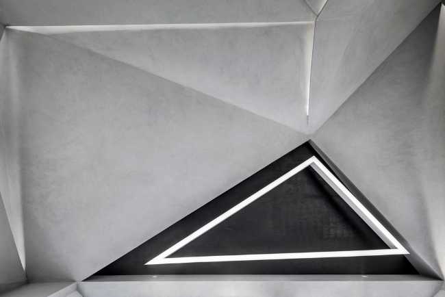 spa centro benessere geometrico controsoffitti tagli illuminazione finitura grigio