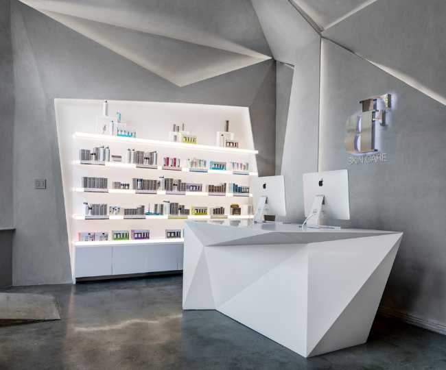 spa centro benessere negozio bancone geometrico controsoffitti tagli illuminazione