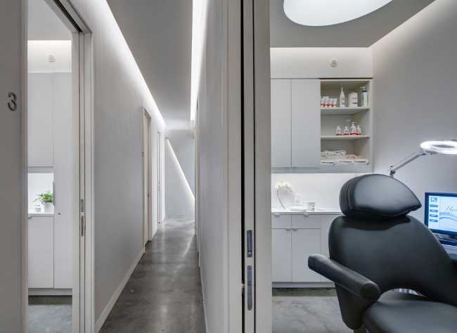 spa centro benessere negozio bancone geometrico controsoffitti tagli illuminazione