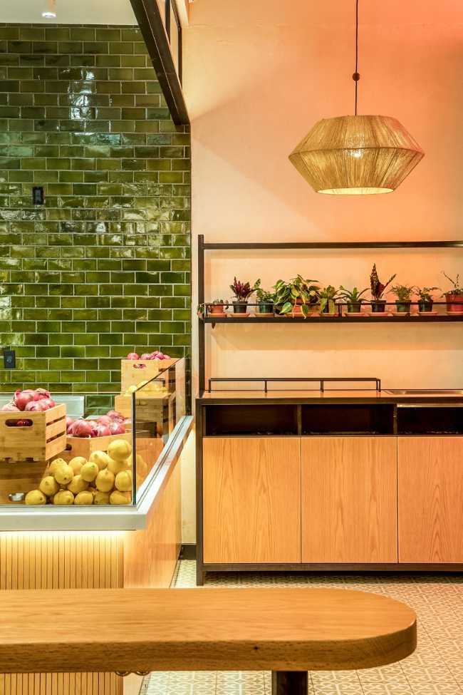 Contrast wall with shiny green tiles and white wall