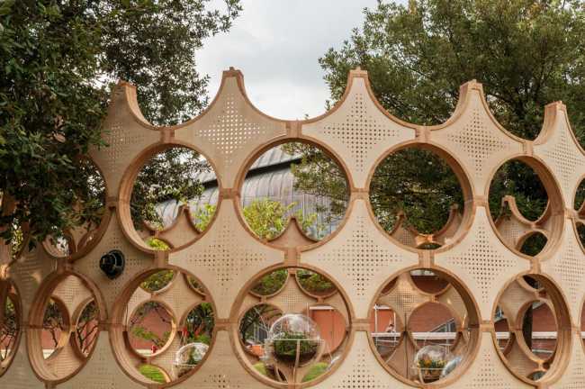Wooden pavilion with geometric shapes