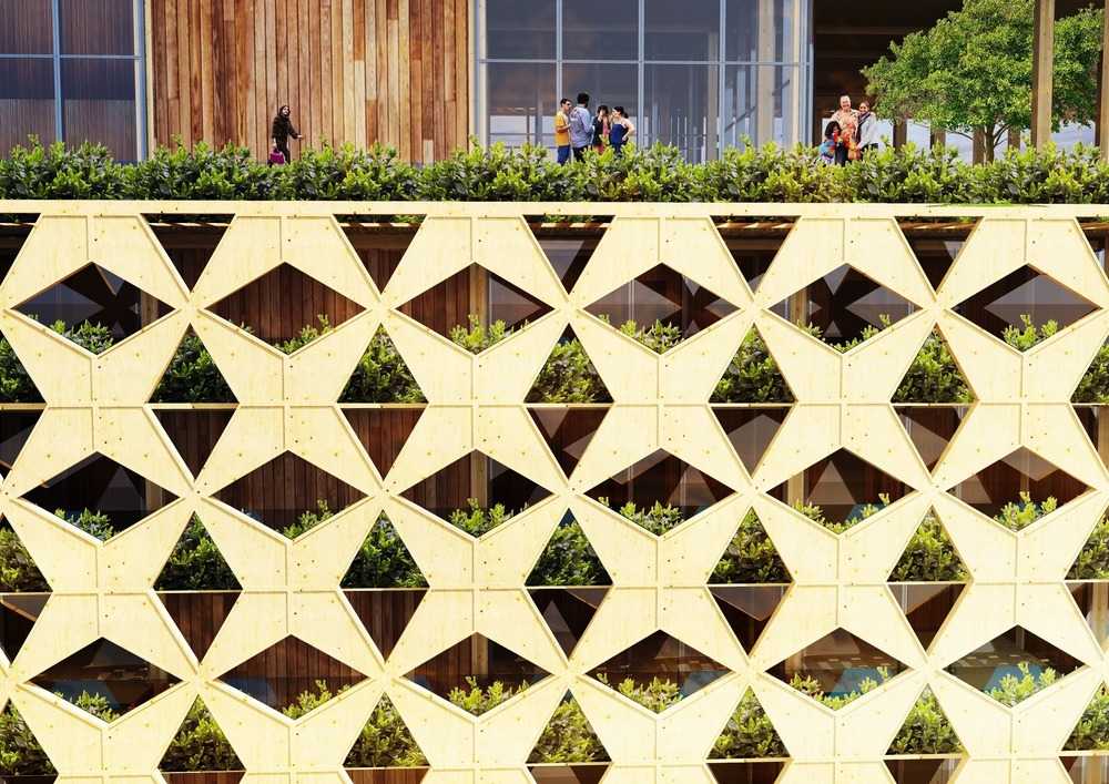 Render di una torre in legno con terrazze verdi