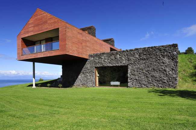 Wooden house in cantilevered