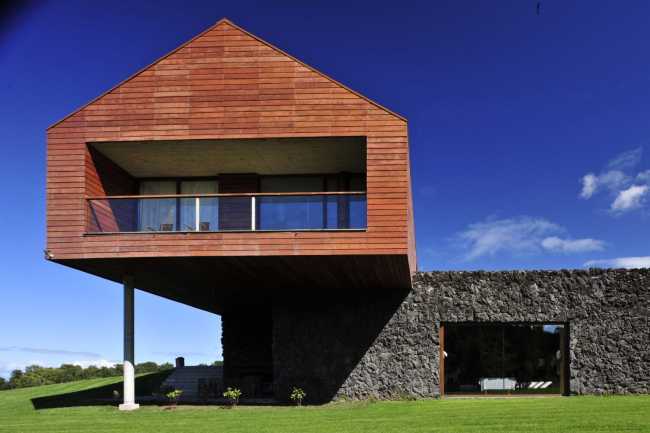 Wooden house in cantilevered