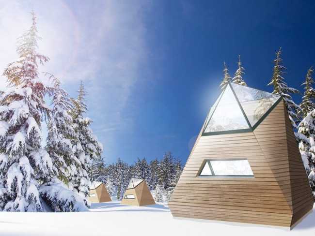 Wooden house with snowy landscape