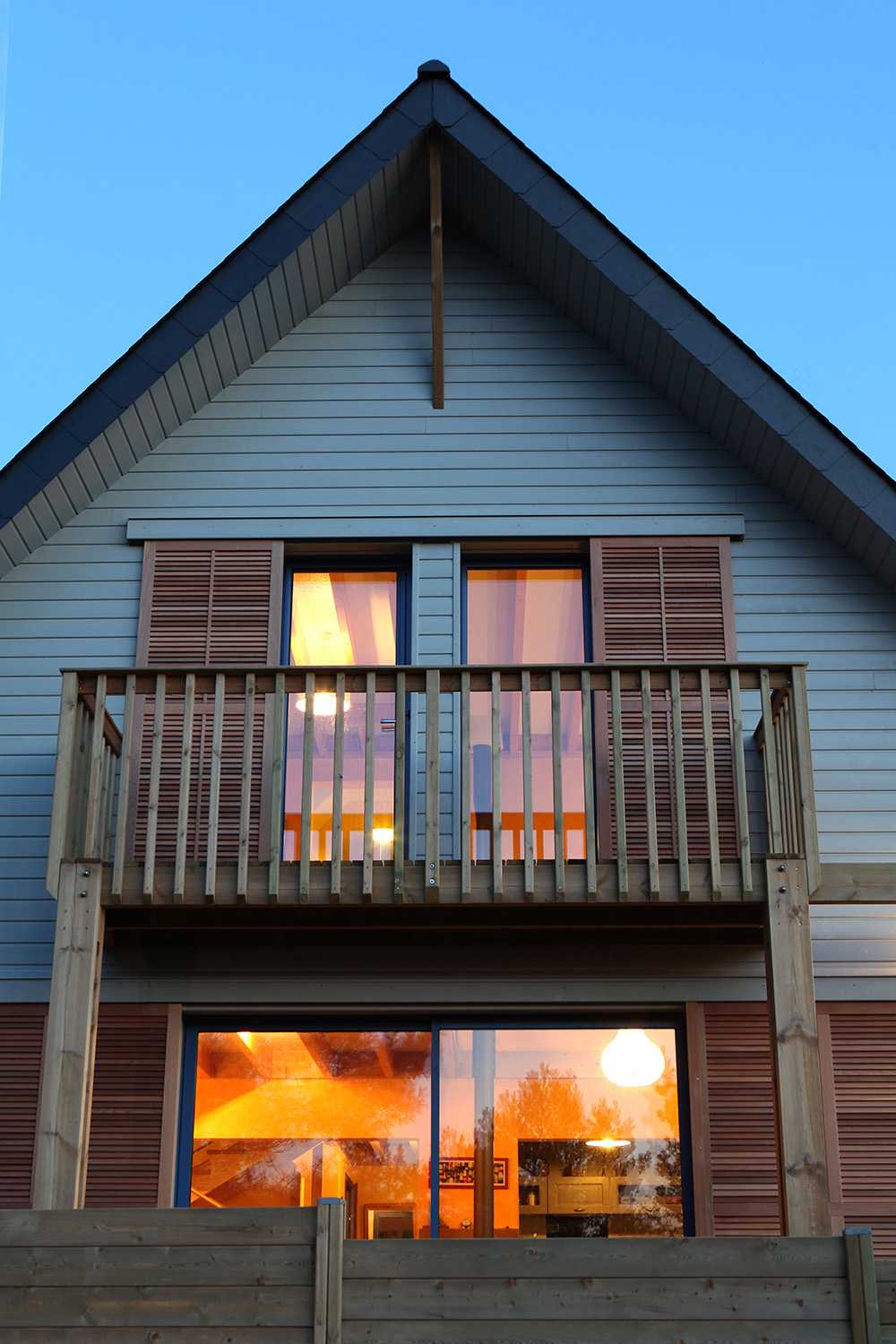 Wooden house with a pitched roof