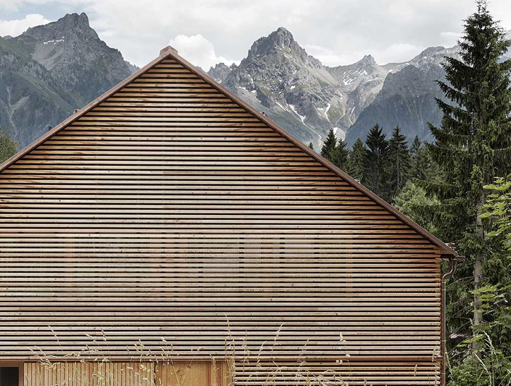 Wooden house with window on the panorama