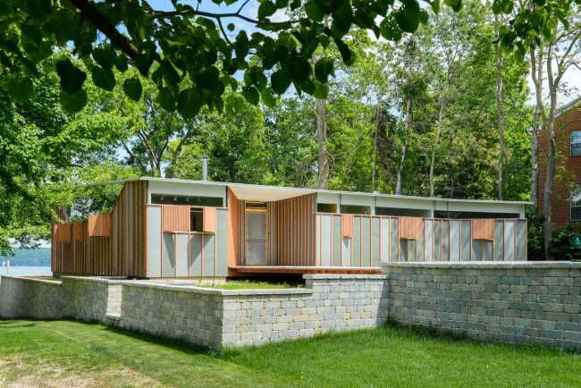 Casa in legno con basamento in pietra