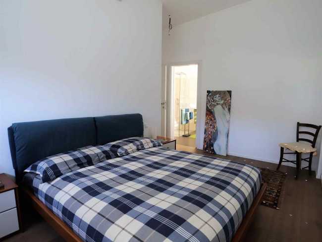 Camera da letto in un'abitazione in legno