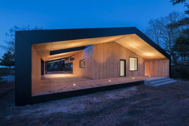 Wooden house with marked profiles