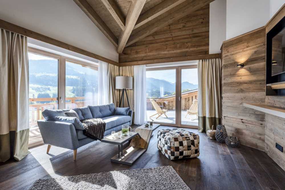 Recovery and restyling of a luxury resort in the Alps