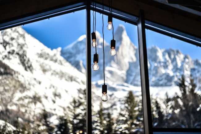 Stained glass window with mountain view