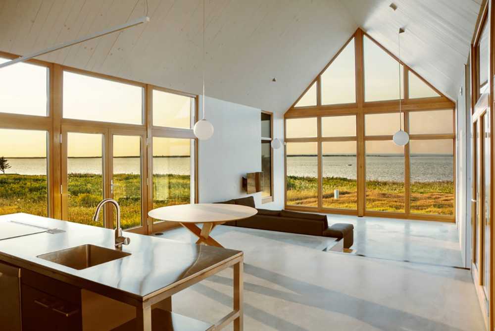 Interior of a wooden house with panorama outside