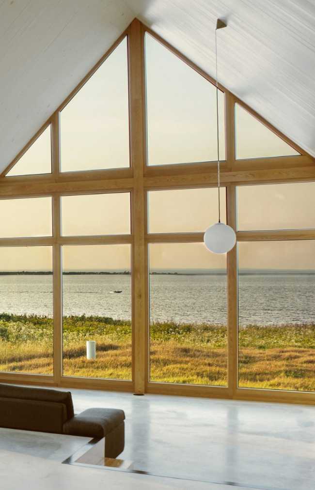Stained glass window of a wooden house