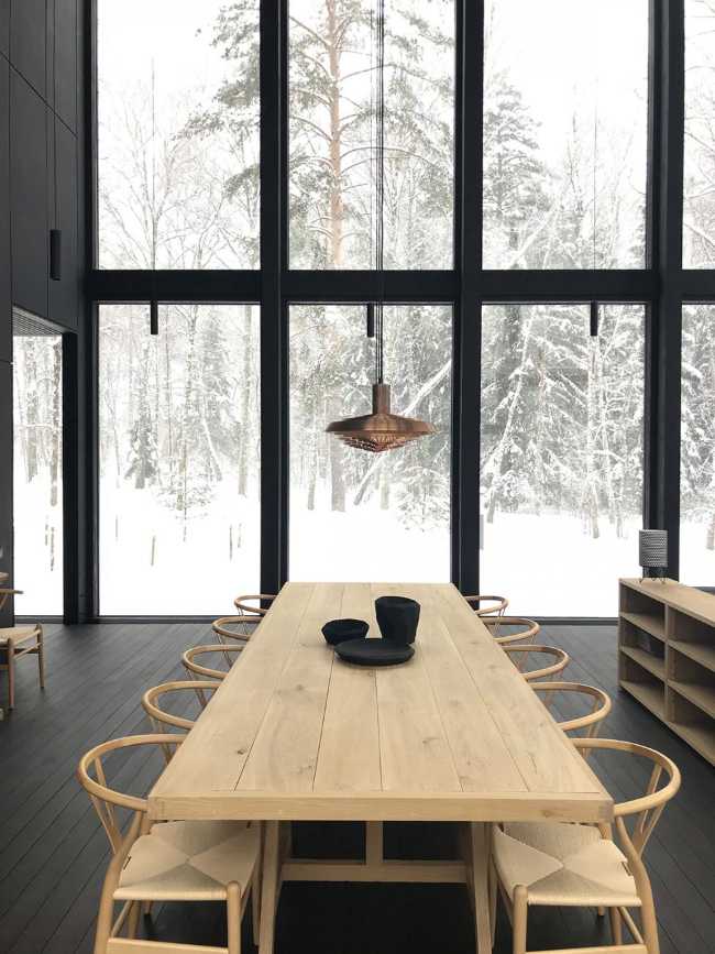 interior in dark wood and light wood with glass