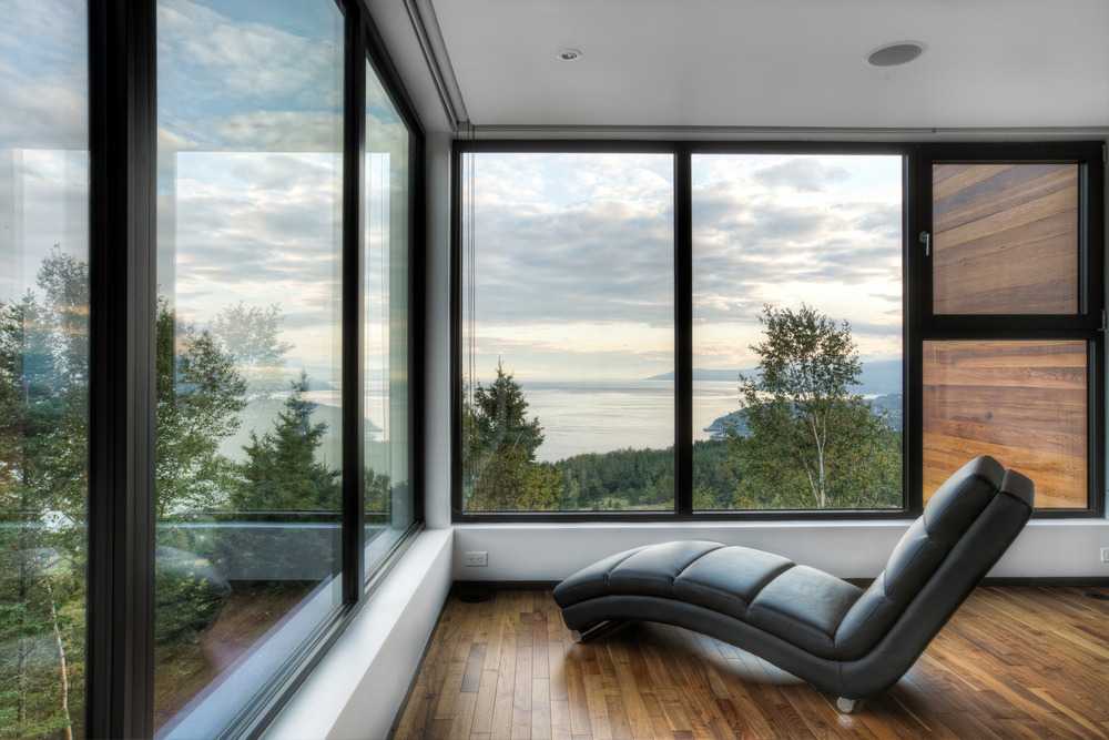 Wooden residences with large windows