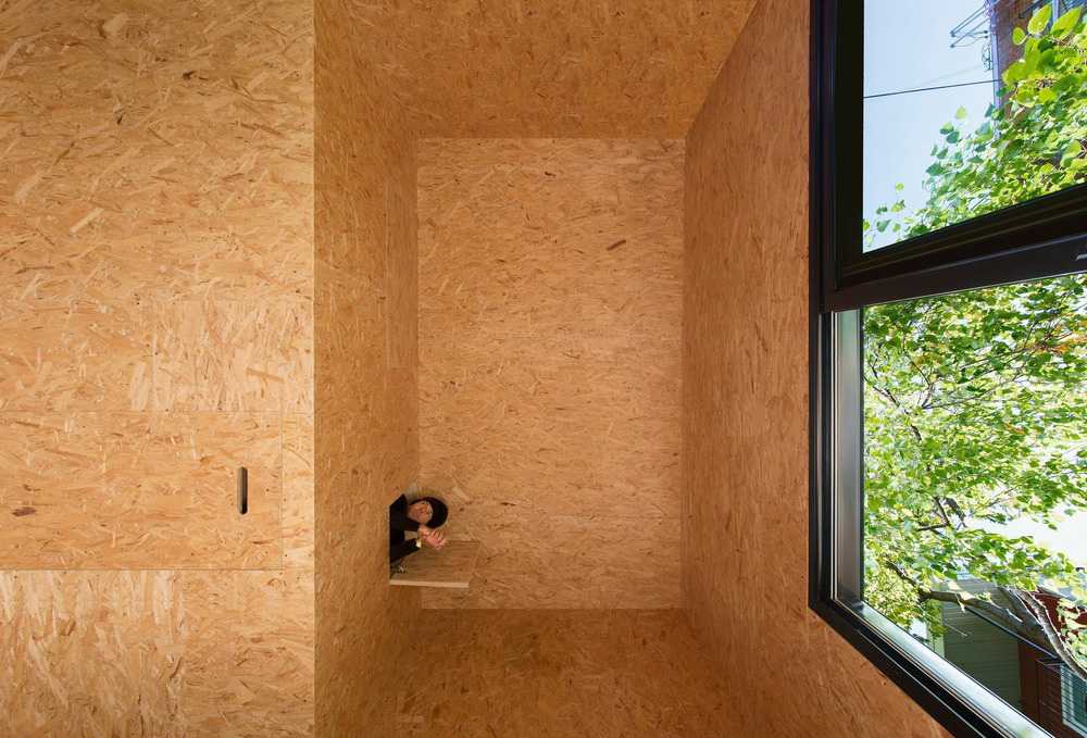 Abitazione in legno tra gli alberi