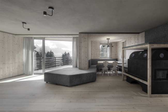 Interni in caldo legno e vetrate sul paesaggio