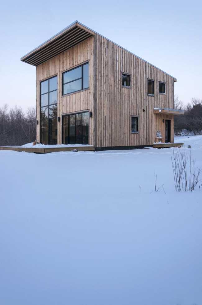 Un rifugio in legno che si fonde nel paesaggio canadese: Wood Duck