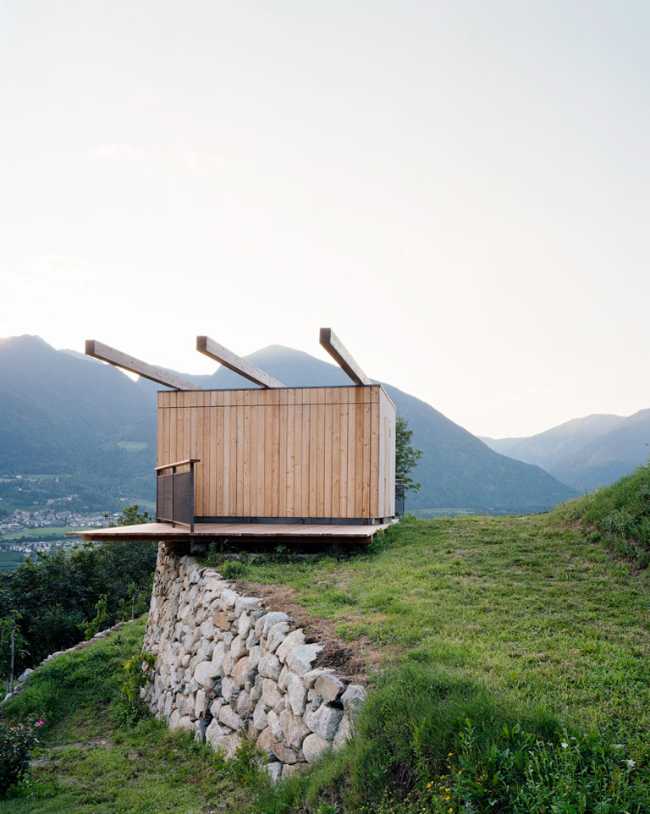 Cube in suspended larch on a slope
